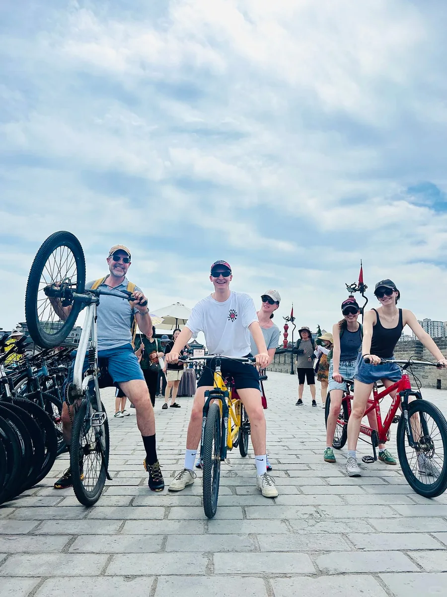 Travelers setting out on a cycling trip in Xi'an